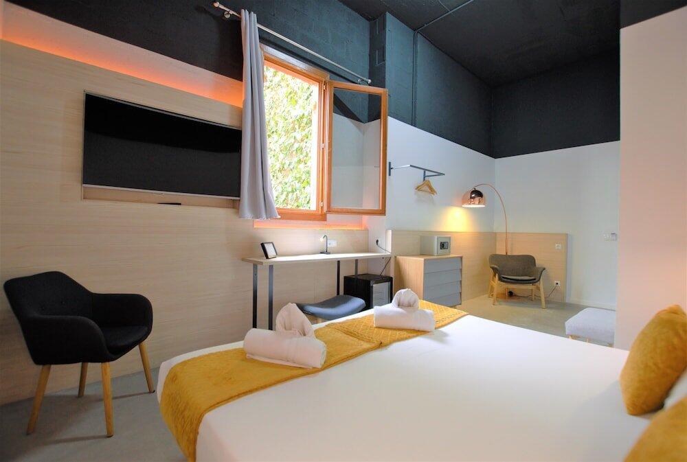 Foto de una habitación de Hotel Brick Palma