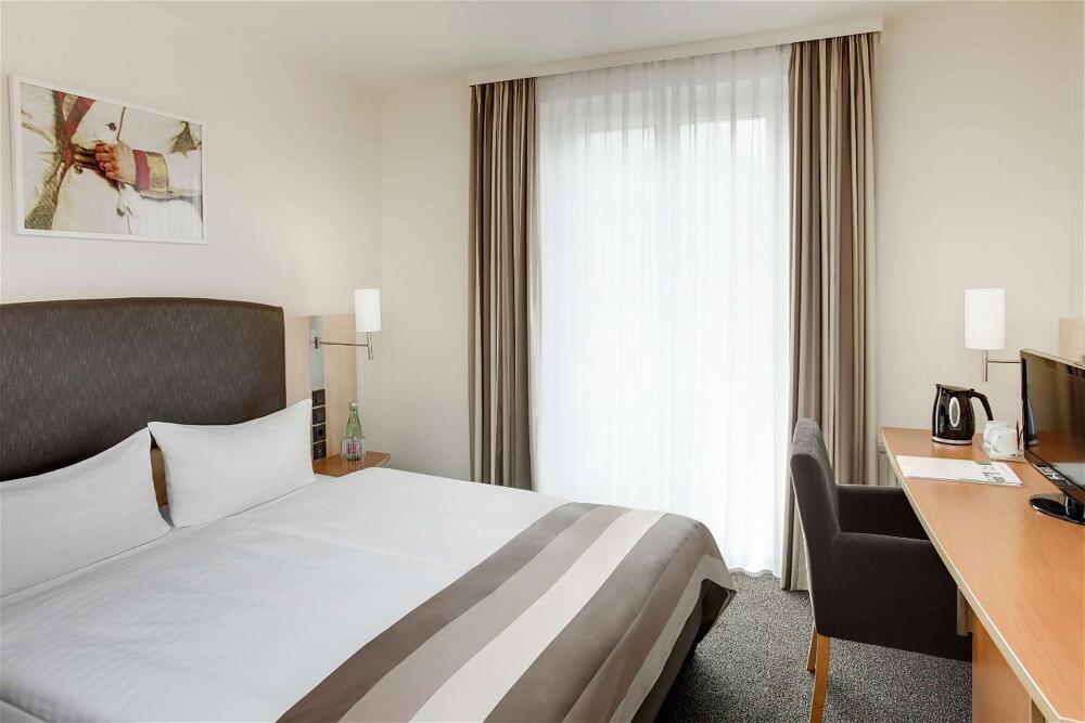 Foto de una habitación de IntercityHotel Wien