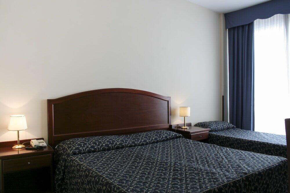Foto de una habitación de Hotel Mediterraneo