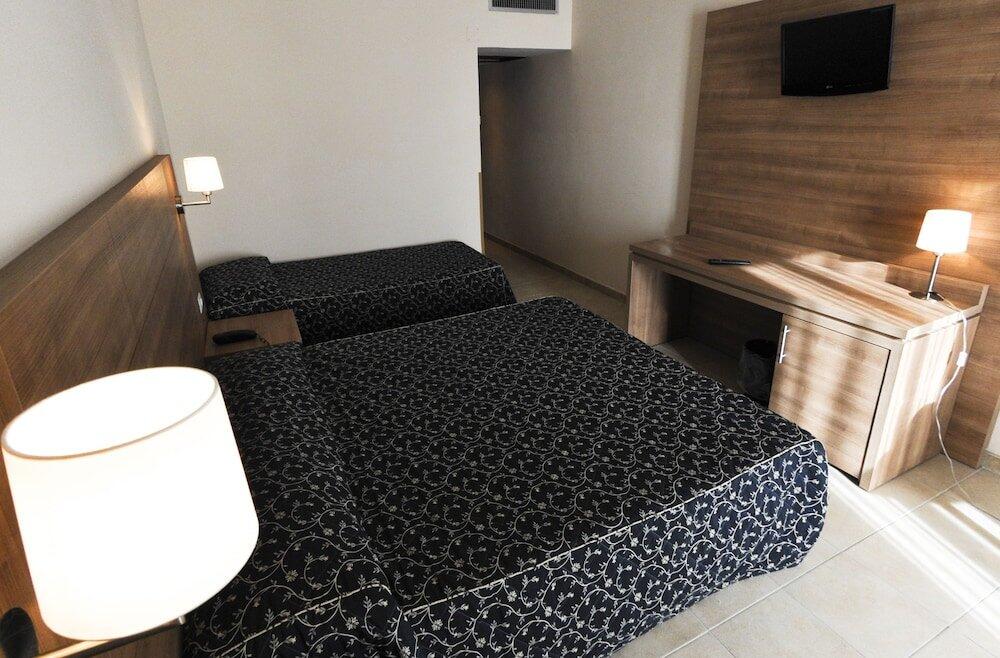 Foto de una habitación de Hotel Mediterraneo