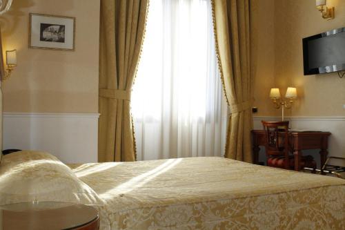 Foto de una habitación de Hotel Villa Pinciana