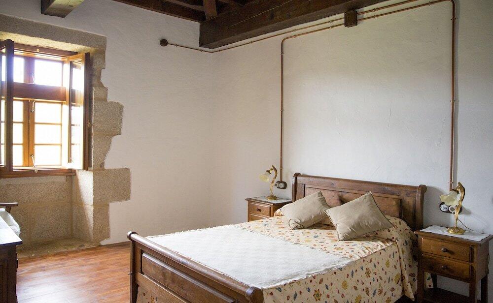 Foto de una habitación de Hostel Monasterio de Moraime