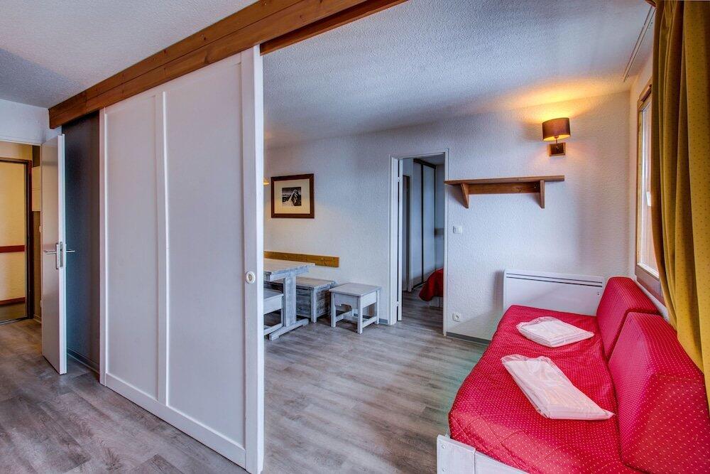Foto de una habitación de Apartamentos Vacancéole - Le Borsat IV