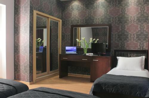 Foto de una habitación de Galaxy Art Hotel