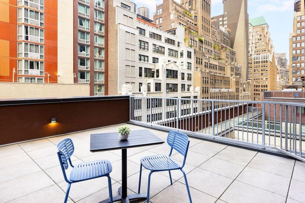 Foto de una habitación de Hotel SpringHill Suites by Marriott New York Manhattan/Times Square South