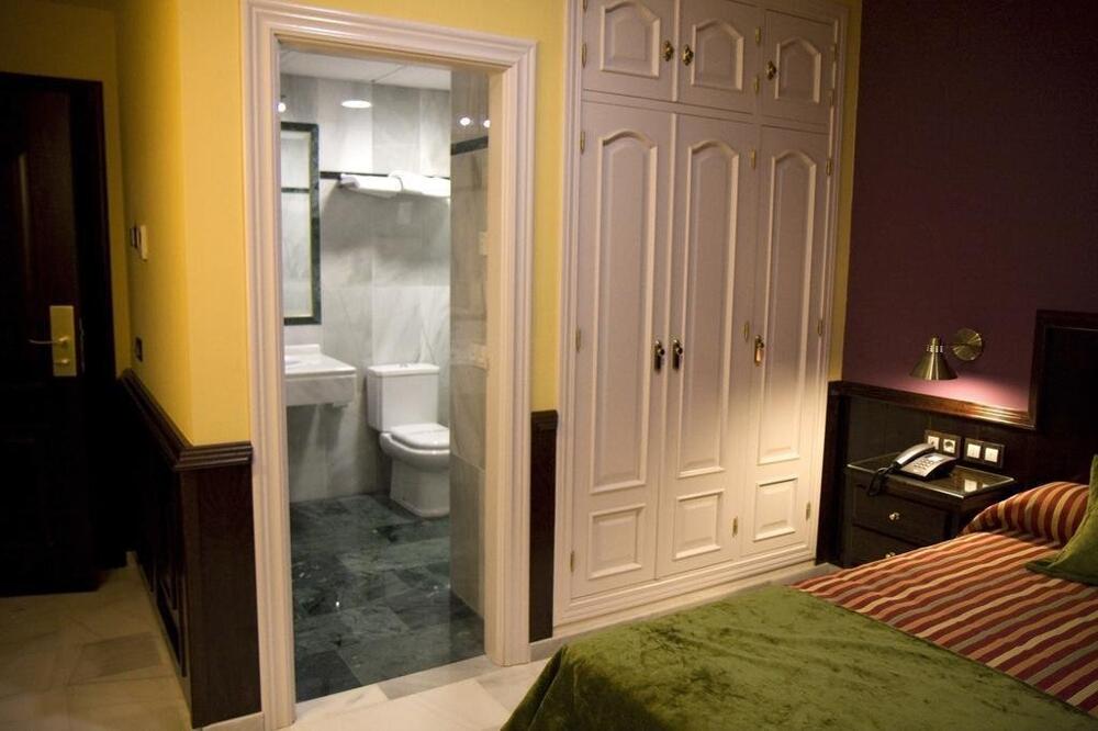 Foto de una habitación de Hotel Las Acacias