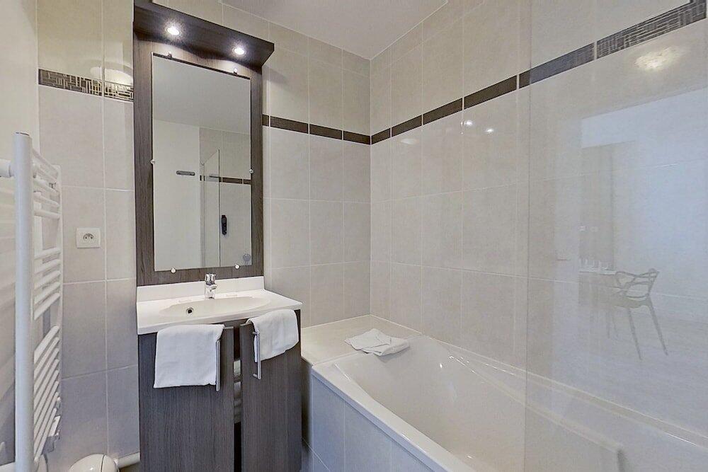 Foto del baño de City Résidence Tours