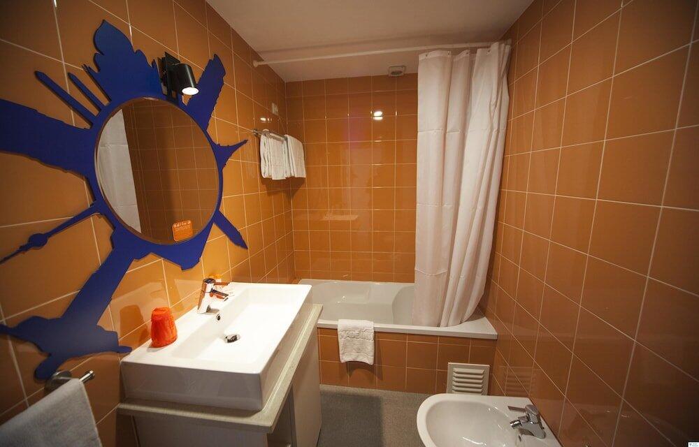Foto del baño de Hotel Made Inn