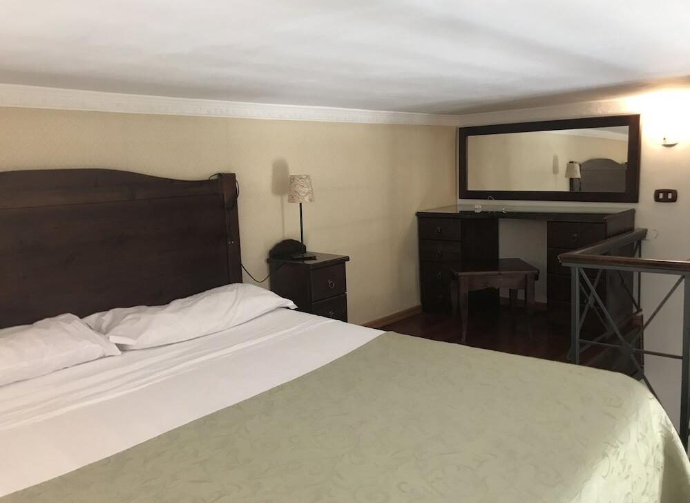 Foto de una habitación de B&amp;amp;B Art Suite Principe Umberto