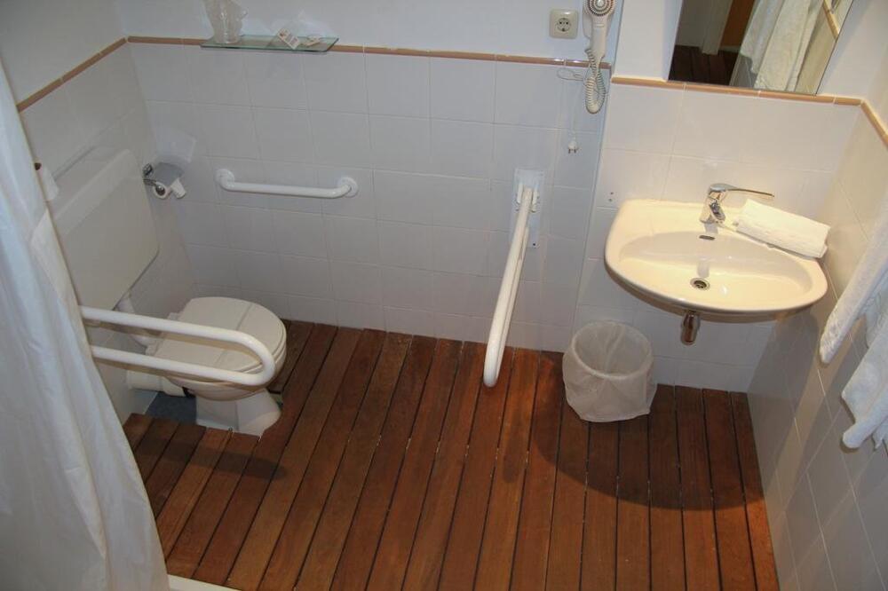 Foto del baño de AHC Hoteles