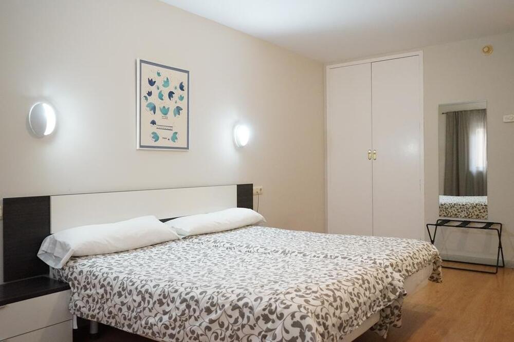 Foto de una habitación de AHC Hoteles