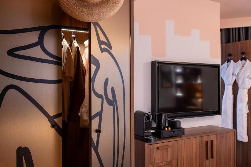 Foto de una habitación de Hotel AROTEL