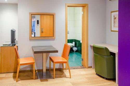 Foto de una habitación de Wellness Apart Hotel
