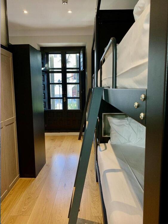 Foto de una habitación de Complutum Hostel