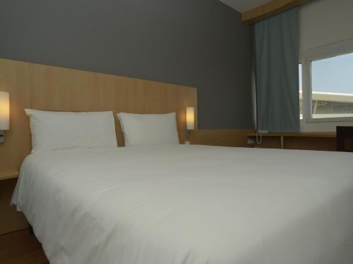 Foto de una habitación de Hotel ibis Lisboa Parque das Naçoes