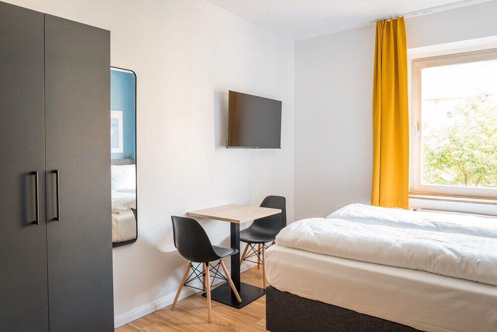 Foto de una habitación de Antares Apartments