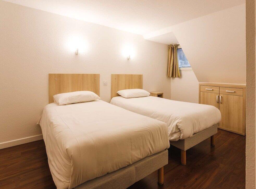 Foto de una habitación de Aparthotel Garden &amp;amp; City Cauterets Balneo