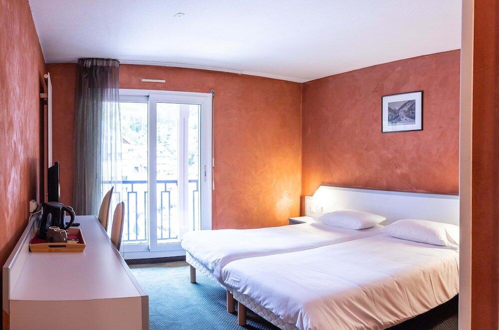 Foto de una habitación de Aparthotel Garden &amp;amp; City Cauterets Balneo