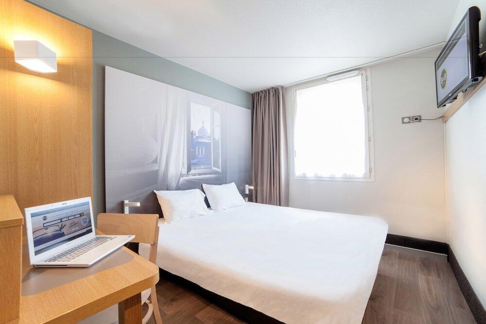 Foto de una habitación de B&amp;amp;B Hôtel Paris Malakoff Parc des Expositions