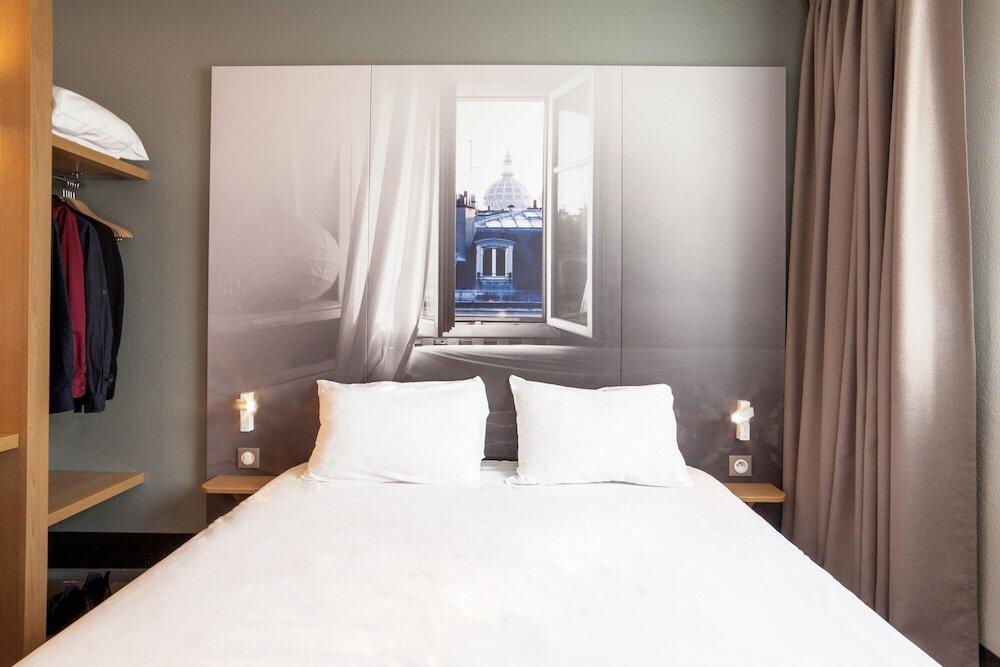 Foto de una habitación de B&amp;amp;B Hôtel Paris Malakoff Parc des Expositions