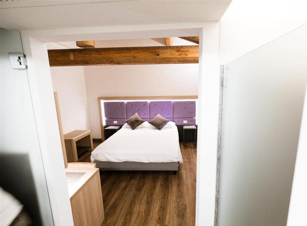 Foto de una habitación de Hotel Corona