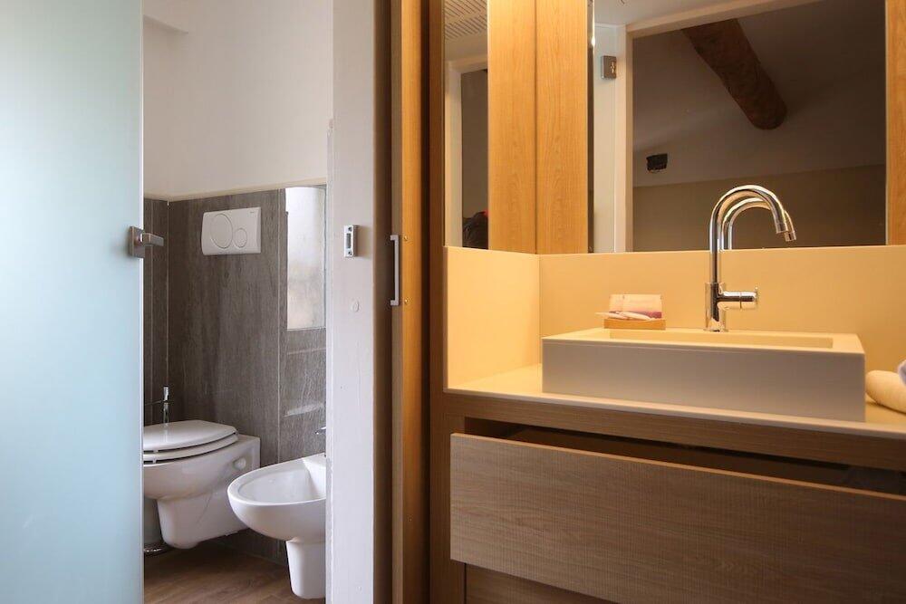 Foto del baño de Hotel Corona
