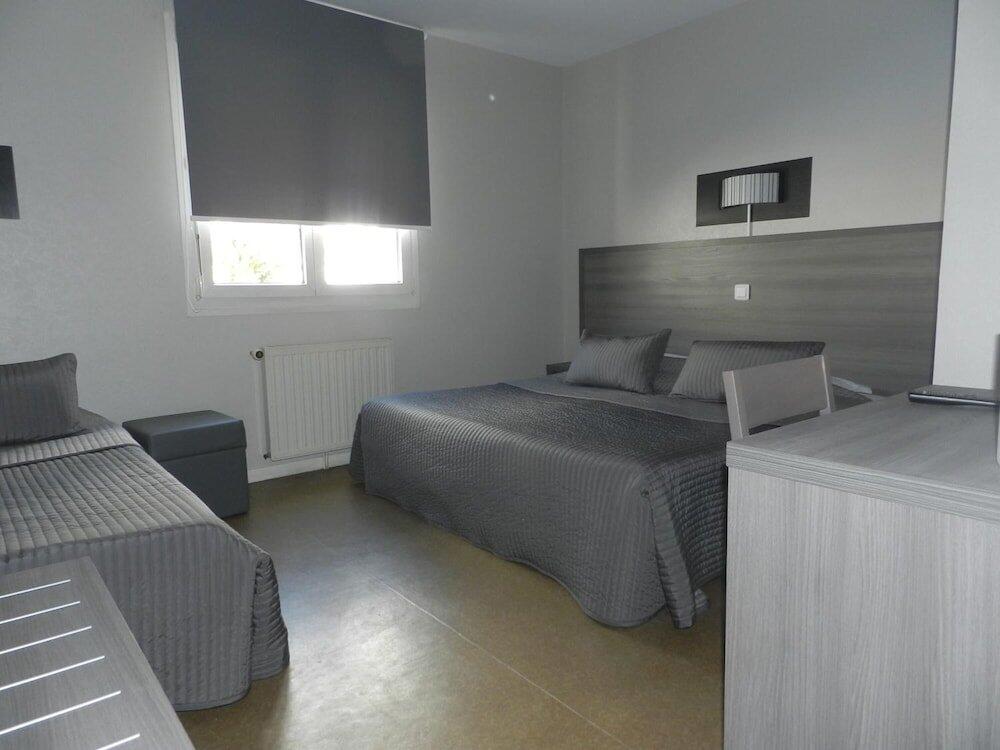 Foto de una habitación de Hôtel Le Cerizay