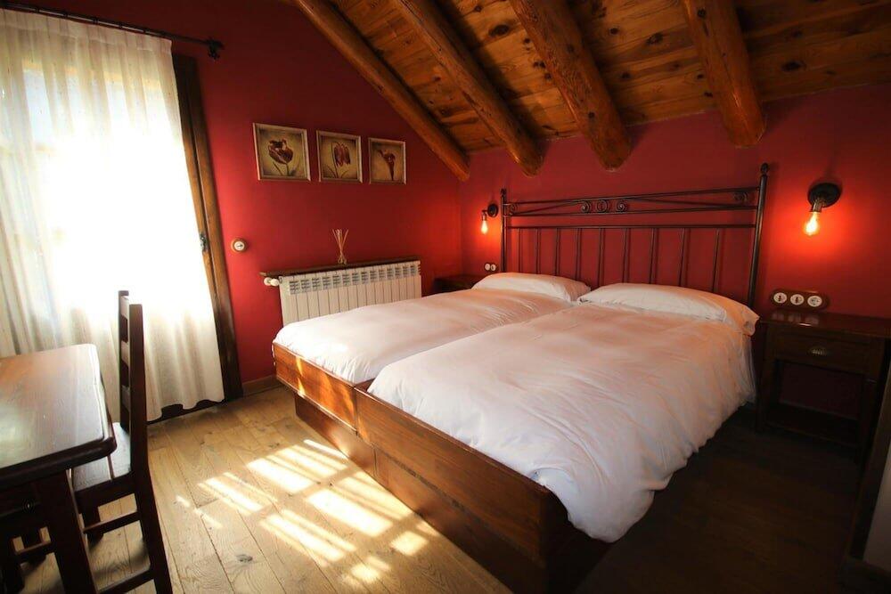 Foto de una habitación de Hotel Rural El Mirador de los Pirineos
