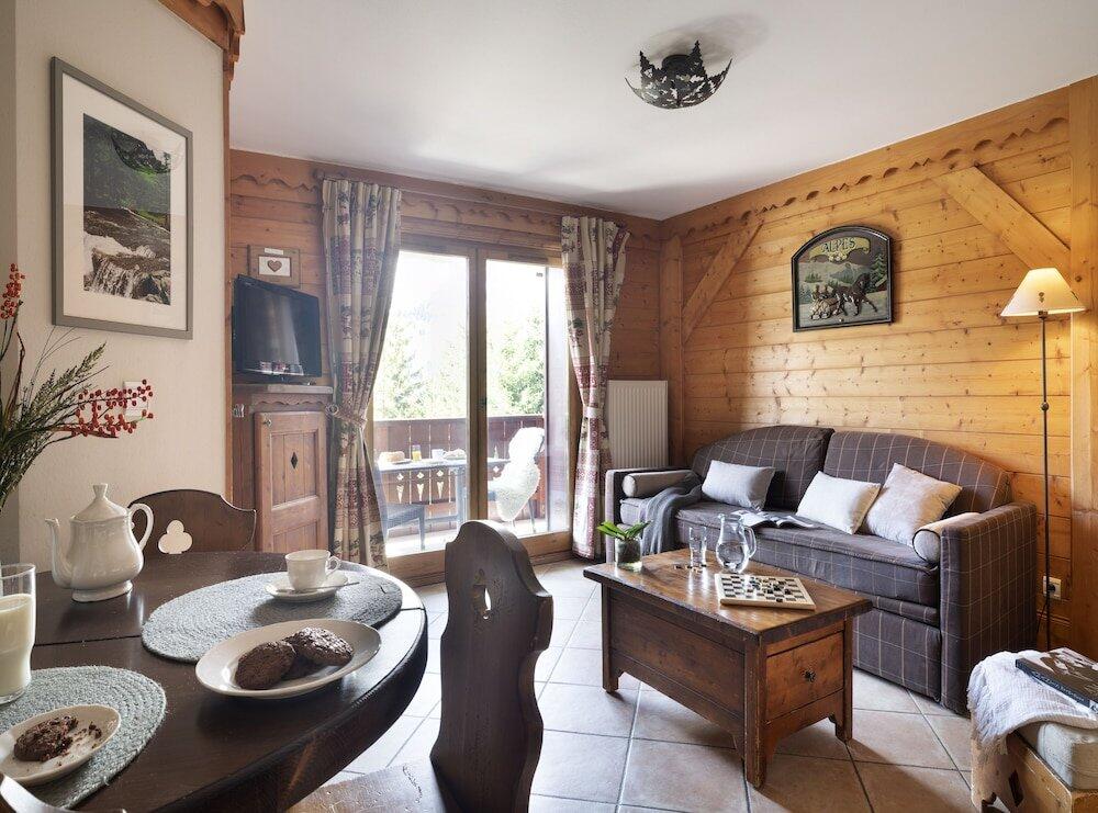 Foto de una habitación de Résidence Pierre &amp;amp; Vacances Premium Les Fermes De Méribel
