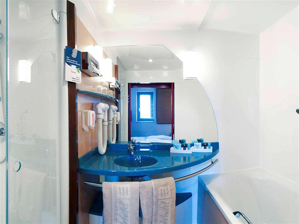 Foto del baño de Hotel Novotel Suites Hannover