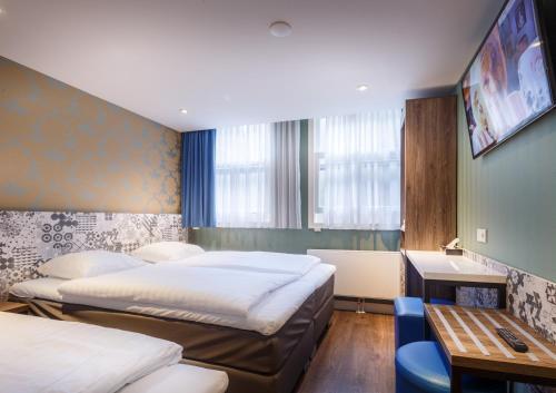 Foto de una habitación de The Old Nickel Hotel