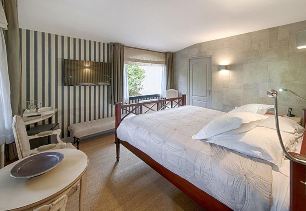 Foto de una habitación de Hotel Du Côté Des Olivades