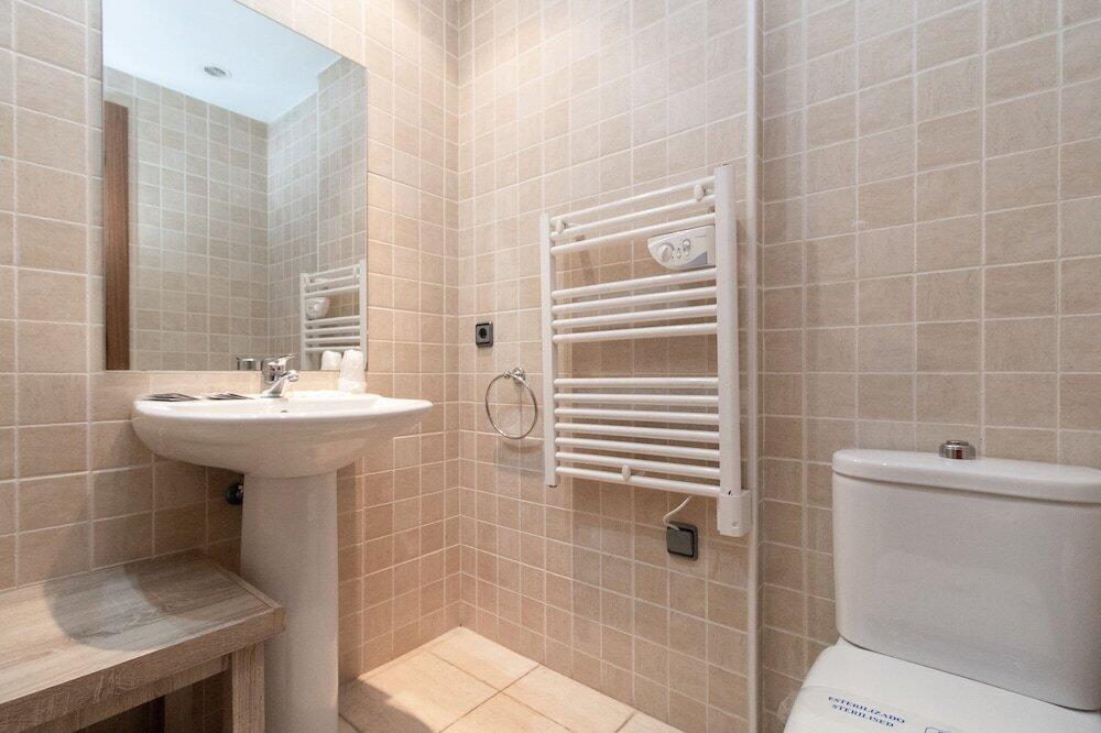 Foto del baño de Apartamentos Araco 3000