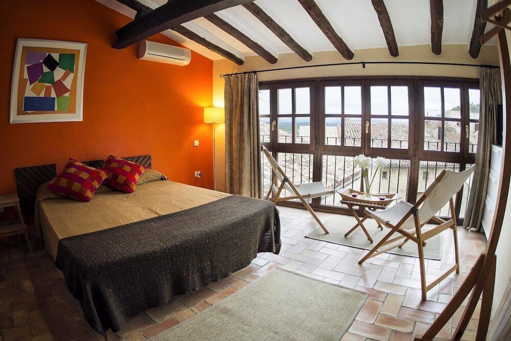 Foto de una habitación de Aparthotel Lo Raconet de la Plaça