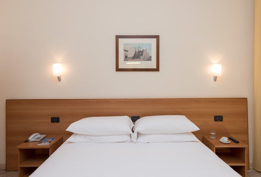 Foto de una habitación de Hotel Casa del Pellegrino