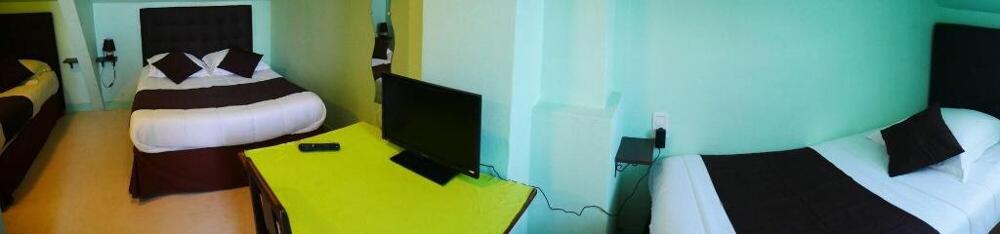 Foto de una habitación de Hotel du Commerce