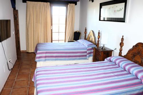 Foto de una habitación de Hostal Rural Turre