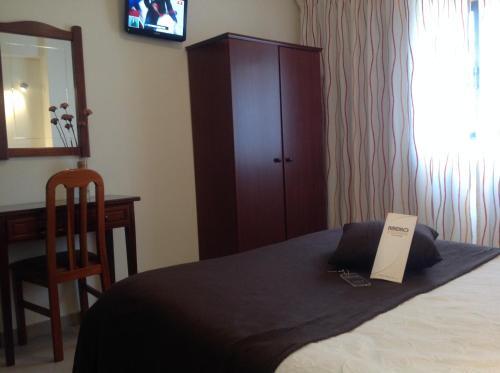 Foto de una habitación de Ribeiro Hotel