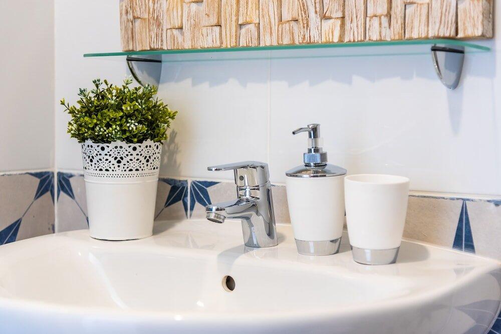 Foto del baño de Albergue OKEANOS Eco Guest House