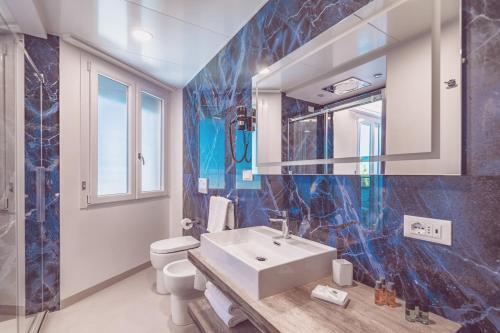 Foto del baño de Hotel Cesare Augustus