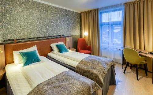 Foto de una habitación de Clarion Collection Hotel Hammer