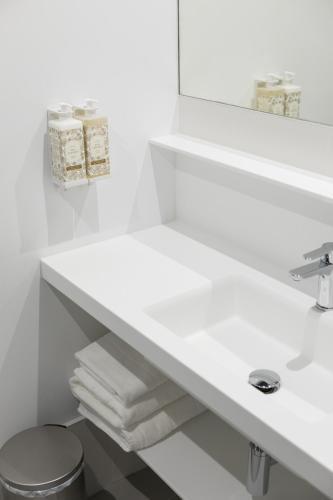 Foto del baño de Apartamentos Las Torres