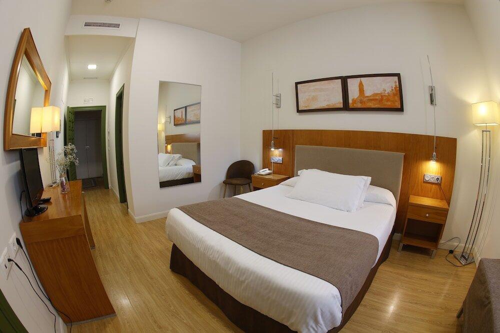 Foto de una habitación de Hotel El Carmen