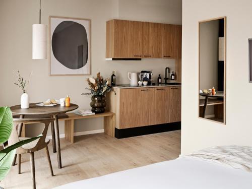 Foto de una habitación de Aura Apartment Hotel