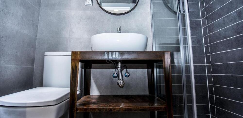 Foto del baño de Albergue Hola Rooms