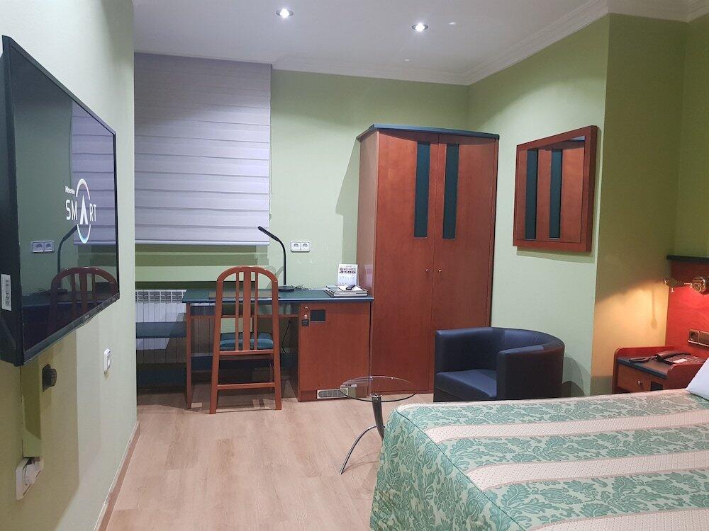 Foto de una habitación de Hotel Idh Angel