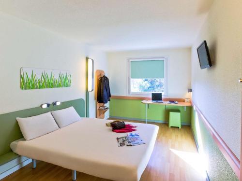 Foto de una habitación de Hotel Ibis Budget Madrid Alcalá de Henares La Dehesa