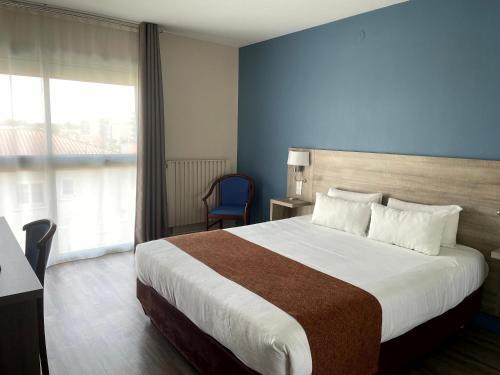 Foto de una habitación de Grand Hotel