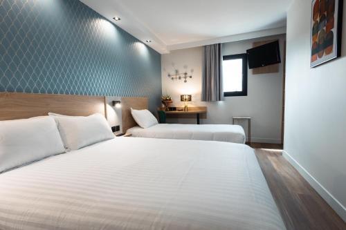 Foto de una habitación de KYRIAD DIRECT ORLEANS NORD - Cap Saran