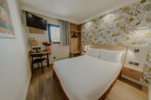 Foto de una habitación de KYRIAD DIRECT ORLEANS NORD - Cap Saran